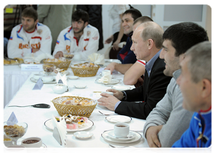 Prime Minister Vladimir Putin speaks with members of the national judo team during a visit to the Regional Judo Centre in Kemerovo|24 january, 2012|18:17