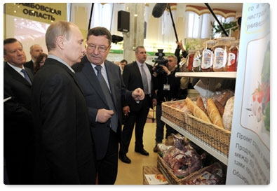 Vladimir Putin attends an agricultural exhibition during his working visit to the Tambov Region