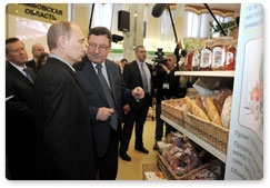 Vladimir Putin attends an agricultural exhibition during his working visit to the Tambov Region