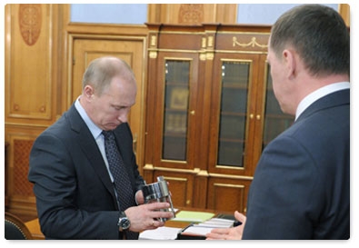 Prime Minister Vladimir Putin meets with Minister of Natural Resources and Environment Yury Trutnev