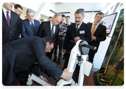 Prime Minister Vladimir Putin visiting the Novosibirsk Academic Town Technology Park where he examined displays of resident companies|17 february, 2012|17:06