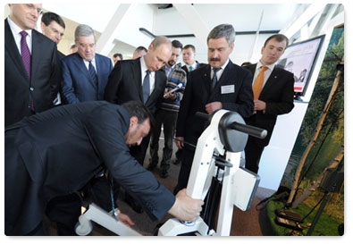 Prime Minister Vladimir Putin visits the Novosibirsk Academic Town Technology Park and an exhibition of its resident companies during a working visit to Novosibirsk