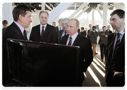 Prime Minister Vladimir Putin visiting the Novosibirsk Academic Town Technology Park where he examined displays of resident companies|17 february, 2012|17:09