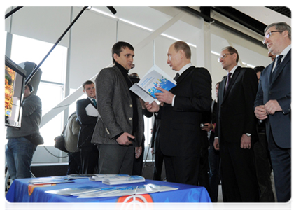 Prime Minister Vladimir Putin visiting the Novosibirsk Academic Town Technology Park where he examined displays of resident companies|17 february, 2012|17:16