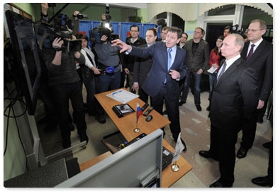 Vladimir Putin visits polling station in Novosibirsk