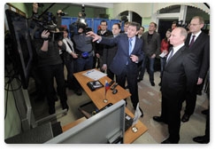 Vladimir Putin visits polling station in Novosibirsk