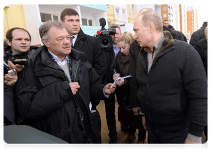 In Astrakhan, Prime Minister Vladimir Putin inspects a new block of flats provided to the residents of a building that was damaged by an explosion|28 february, 2012|17:16