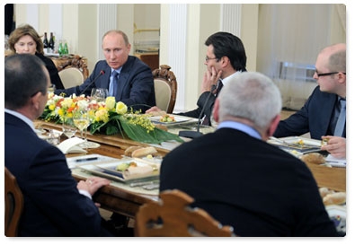 Prime Minister Vladimir Putin meets with political scientists