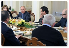 Prime Minister Vladimir Putin meets with political scientists