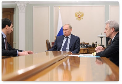 Prime Minister Vladimir Putin holds a working meeting with Minister of Communications and Mass Media Igor Schyogolev and Minister of Education and Science Andrei Fursenko
