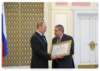 Prime Minister Vladimir Putin awards government certificates of appreciation at the meeting devoted to the 20th anniversary of the Russian Trilateral Commission on the Regulation of Social and Labour Relations|15 march, 2012|15:54