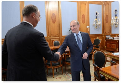 Prime Minister Vladimir Putin meets with Russian Direct Investment Fund CEO Kirill Dmitriev