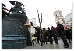 Prime Minister Vladimir Putin attends the opening of a monument to Mstislav Rostropovich at the intersection of Bryusov Pereulok and Yeliseyevsky Pereulok in central Moscow