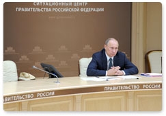 Prime Minister Vladimir Putin holds a video conference on the completion of the bridge across the Eastern Bosporus Strait as part of preparations for APEC-2012 Leaders Week, and on wildfires in the Trans-Baikal Territory